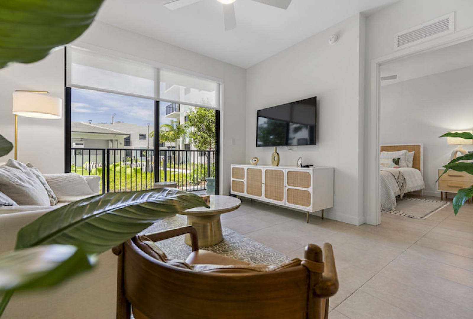 lounge room with a large community table, modern art-decor and easy access to additional seating areas
